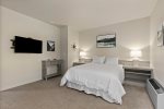 Queen guest suite with 37 in Ultra HD TV with cable